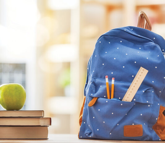 Apple, Pile Of Books And Pencils