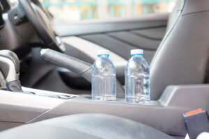 Drinking Water In The Car Prepared For Traveling