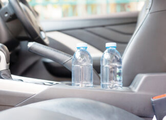 Drinking Water In The Car Prepared For Traveling