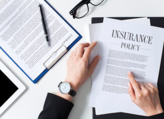 Business woman showing insurance document