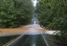 Torrential Rain Floods A Road