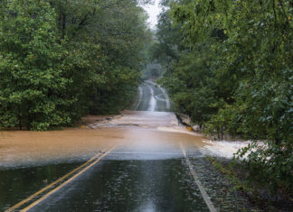 Torrential Rain Floods A Road