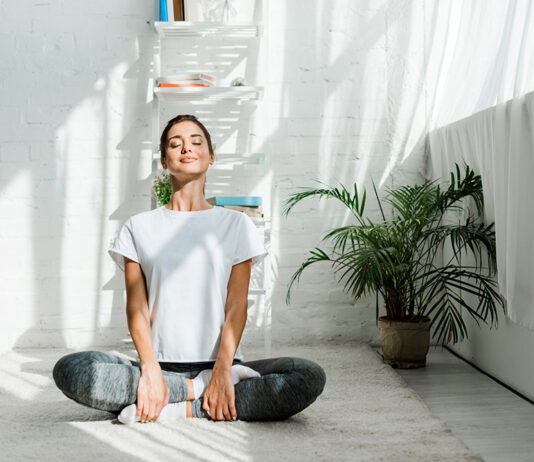 Woman Practicing Yoga