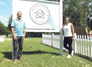 Freedom Life Founders with Sign