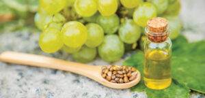 Grape Seed Oil In A Small Jar. Selective Focus.