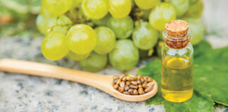 Grape Seed Oil In A Small Jar. Selective Focus.