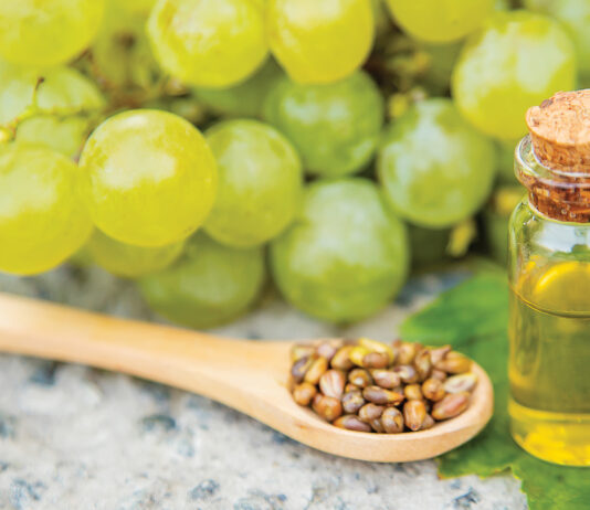 Grape Seed Oil In A Small Jar. Selective Focus.