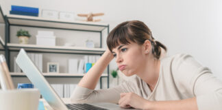 Disappointed Woman Working With A Laptop