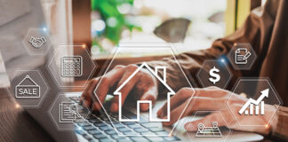 Businessman Using Laptop To Search, Planning And Investing In Real Estate, Property Management Concept