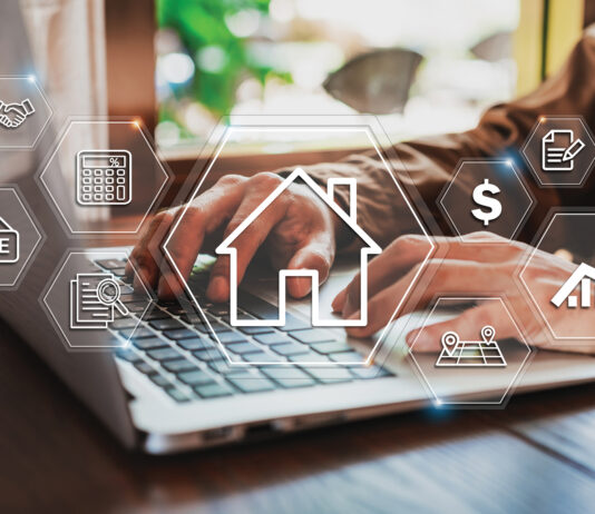 Businessman Using Laptop To Search, Planning And Investing In Real Estate, Property Management Concept