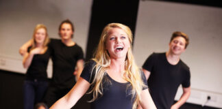 Students Taking Singing Class At Drama College